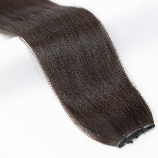 Deep off-black hair extensions for a natural, slightly softer black tone. Available in Weft, Tape, Nano Tip, and Invisi Weft.