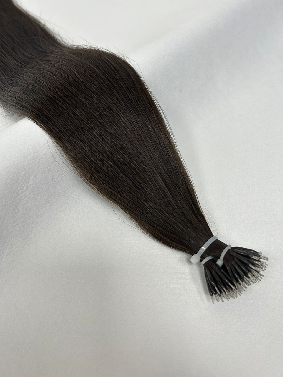 1C Natural Black nano tip hair extensions, featuring a deep off-black shade with discreet nano tips for a flawless, natural blend.