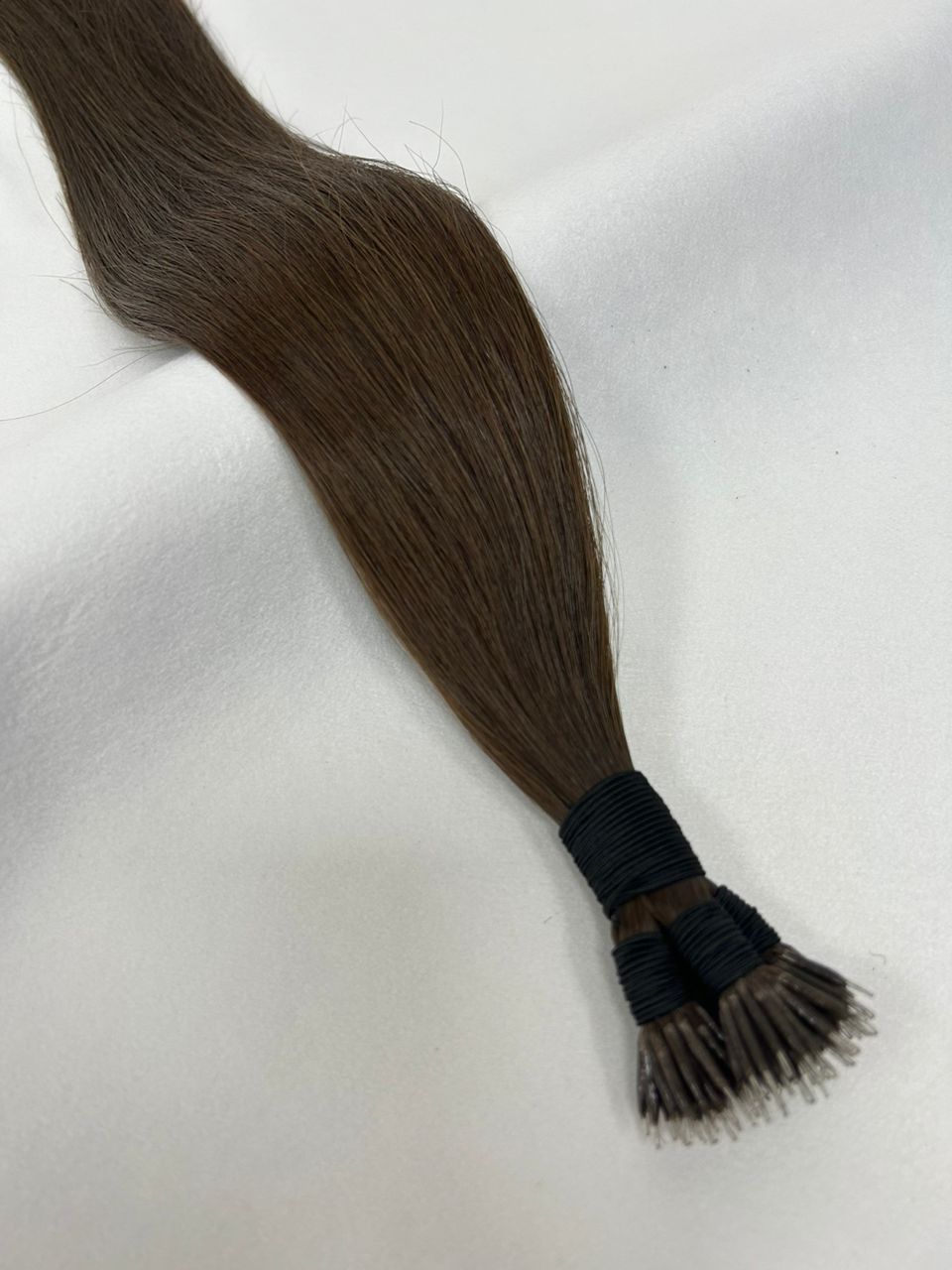 4 Chestnut Brown nano tip hair extensions with ultra-fine tips for a seamless, lightweight blend. A rich, warm brunette shade for natural-looking volume and length.