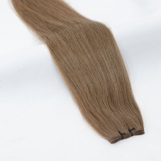 Cool-toned, ash brown hair extensions with subtle depth for a natural blend. Available in Weft, Tape, Nano Tip, and Invisi Weft.