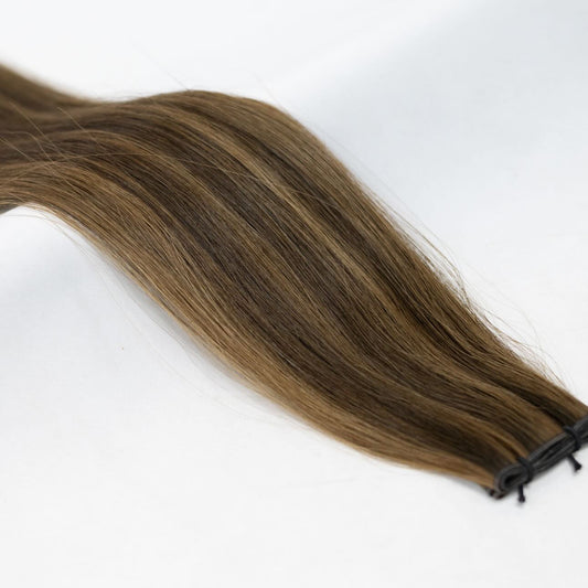 P2/6 hair extensions featuring a natural blend of deep brunette tones for a warm, dimensional look. Available in Weft, Tape, Nano Tip, and Invisi Weft.